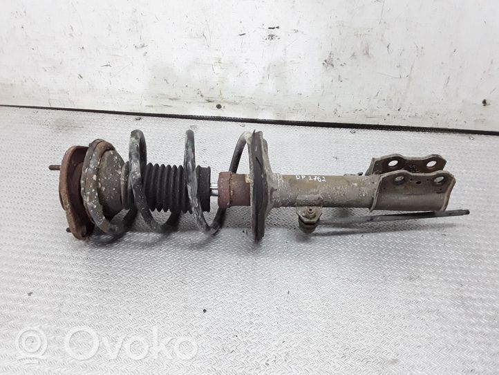 Toyota Corolla E120 E130 Priekinis amortizatorius su spyruokle 