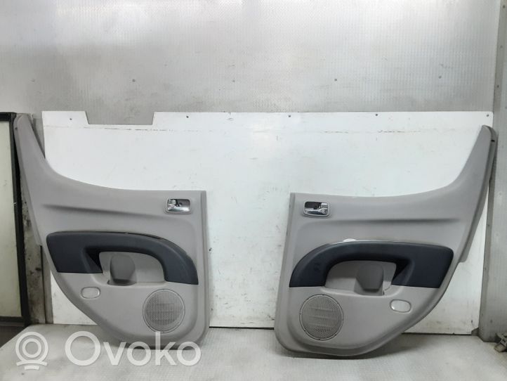 Mitsubishi L200 Boczki / Tapicerka drzwi / Komplet 