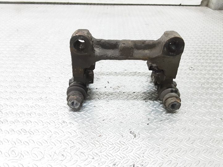 Ford Mondeo MK IV Supporto della pinza del freno posteriore 