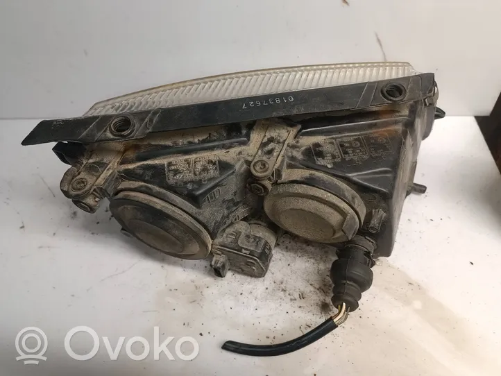 Volkswagen PASSAT B5 Lampa przednia 4411125l