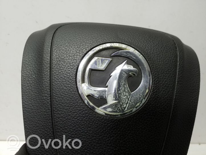 Opel Astra J Poduszka powietrzna Airbag kierownicy 13299779