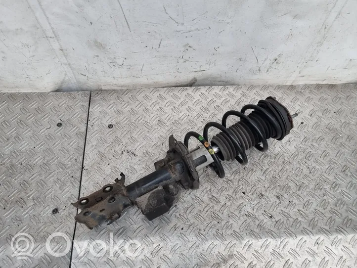 Ford Fiesta Front shock absorber with coil spring C1BC18045BE