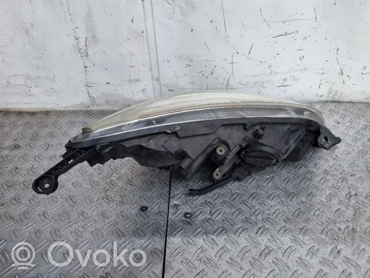 Opel Astra J Lampa przednia 13253656