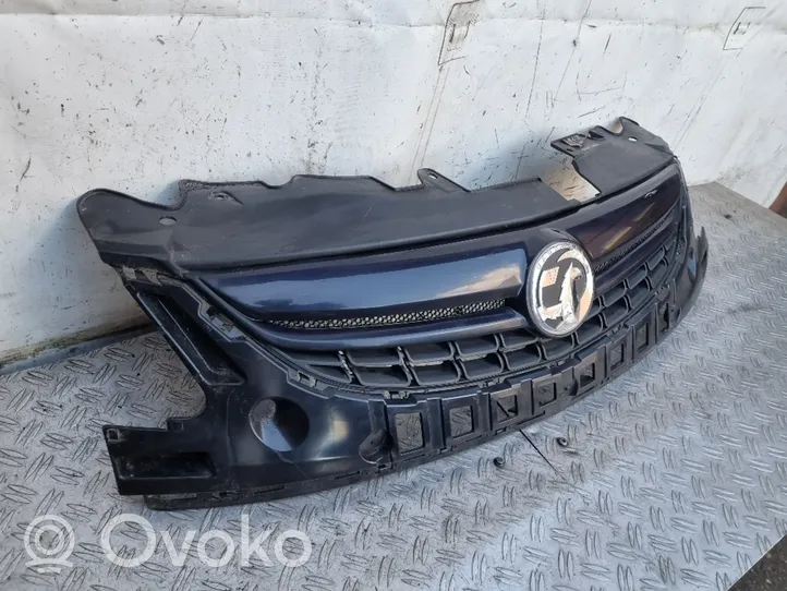 Opel Corsa D Front bumper upper radiator grill 13286000