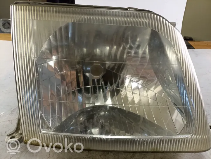 Toyota Land Cruiser (HDJ90) Lampa przednia 11077015