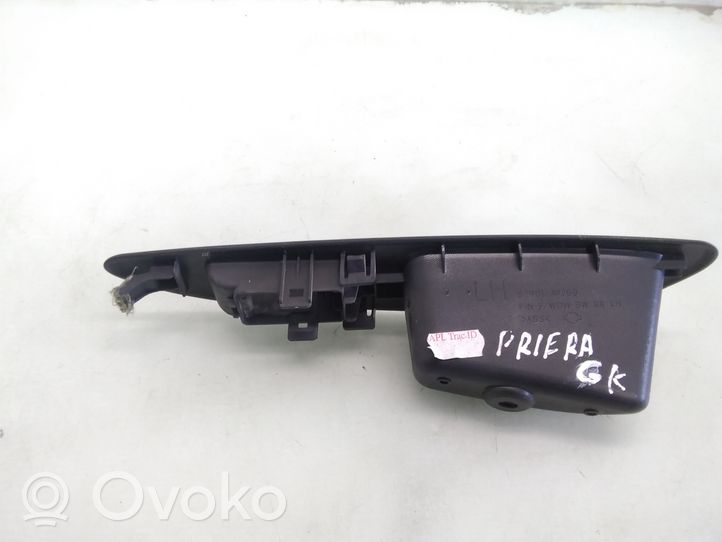 Nissan Primera Ramka przycisku otwierania szyby drzwi tylnych 82961AV760