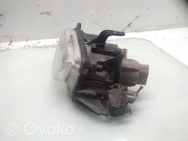 Mazda 323 F Faro/fanale 11061708