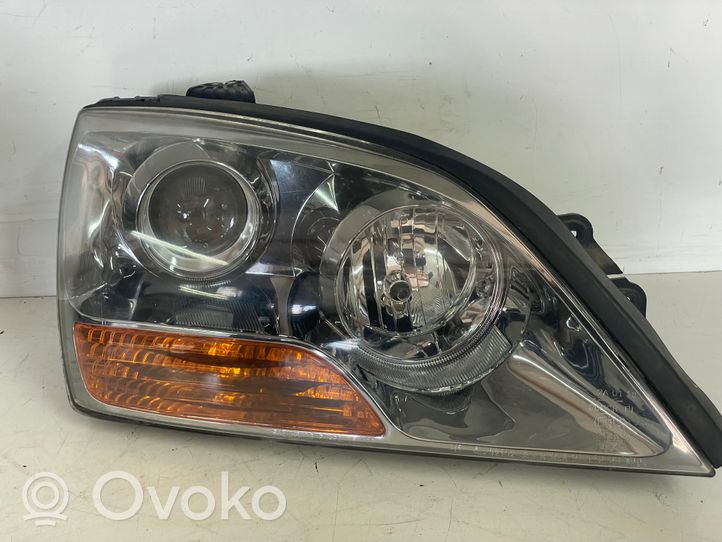 KIA Sorento Lampa przednia 921013E5XX