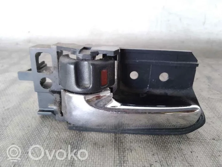 Toyota Corolla E120 E130 Klamka wewnętrzna drzwi 50594A1