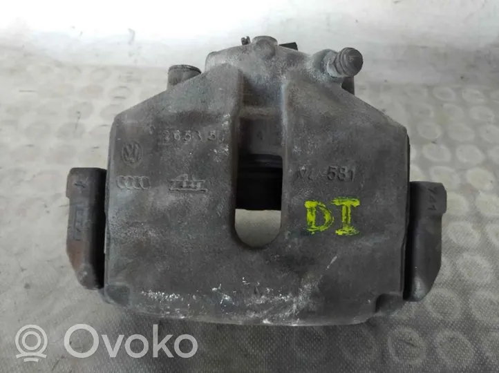 Volkswagen PASSAT Front brake caliper 581