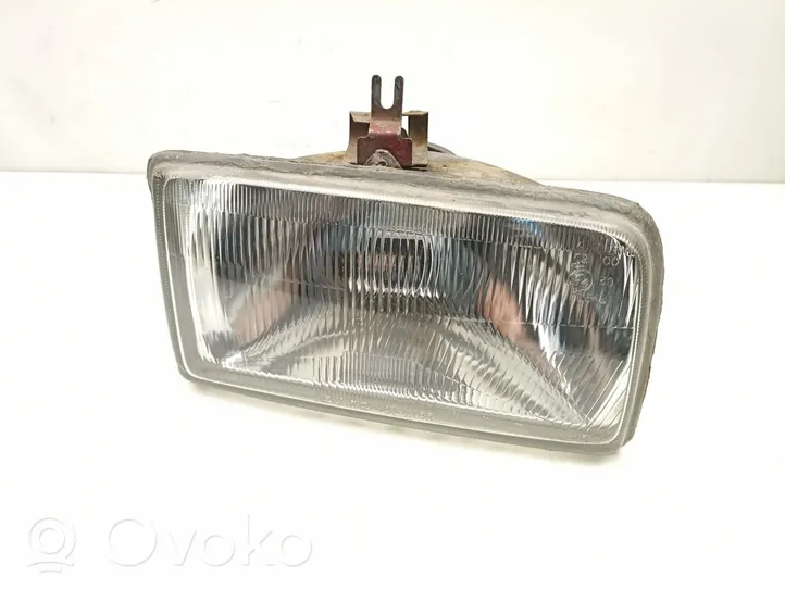 Ford Fiesta Lampa przednia 84FG13005B4B