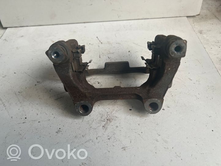 Volkswagen Touran II Supporto della pinza del freno posteriore SUW08480AB