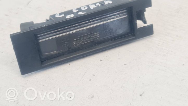 Opel Corsa C Lampa oświetlenia tylnej tablicy rejestracyjnej 09164143