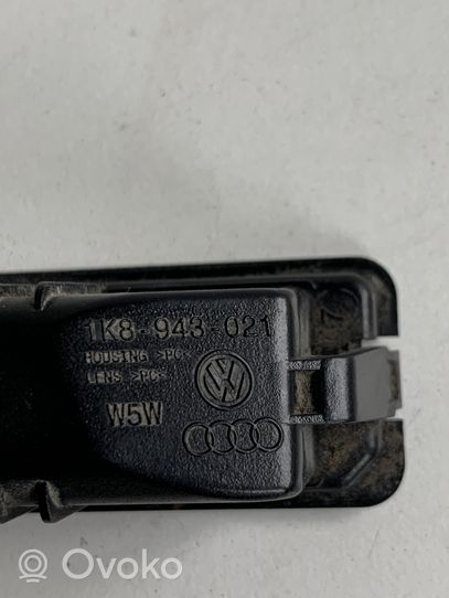 Volkswagen Scirocco Lampa oświetlenia tylnej tablicy rejestracyjnej 1K8943021