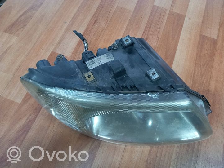 Chrysler Voyager Lampa przednia 04857710AB