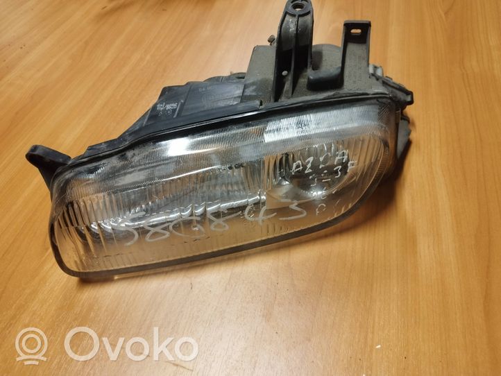 Mazda 323 F Faro/fanale 11061708