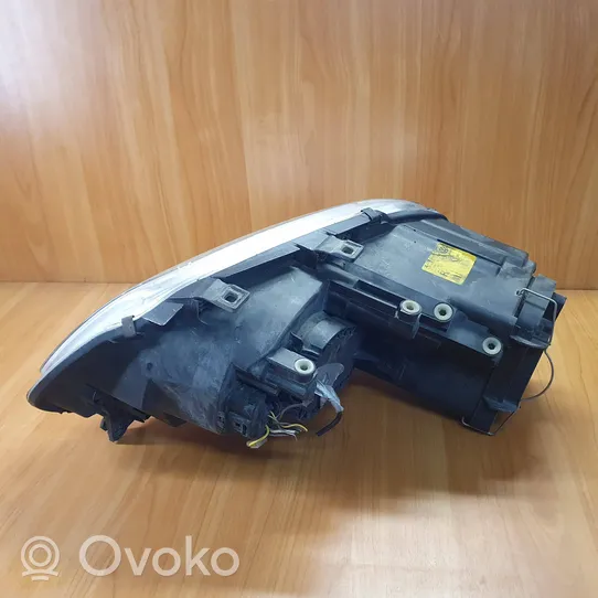 Volkswagen Touran I Lampa przednia 1T0941006F