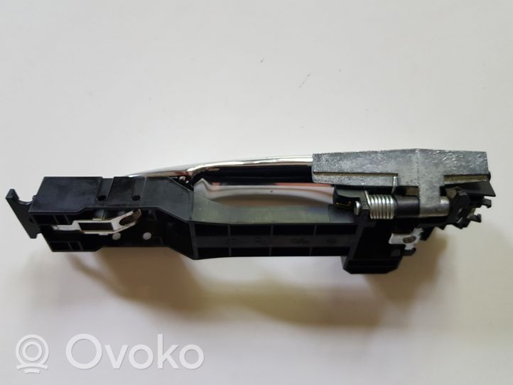 Nissan Rogue Klamka zewnętrzna drzwi przednich 806105AA0A