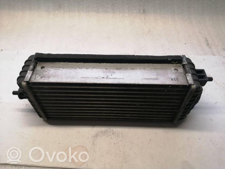 KIA Carens III Radiador intercooler 282702A820