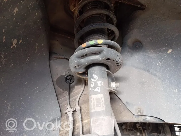 Volkswagen PASSAT Front shock absorber/damper 3AA413031M