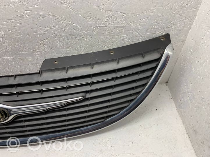 Chrysler Grand Voyager IV Grille de calandre avant 4857522AA