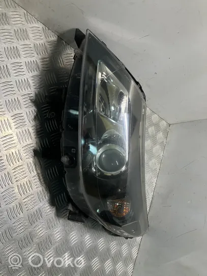 Renault Latitude (L70) Lampa przednia 260604348R