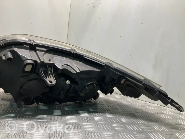 Renault Latitude (L70) Lampa przednia 