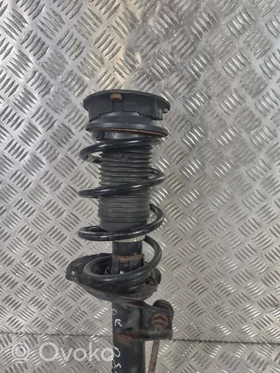 Volkswagen Golf VII Front shock absorber with coil spring 5Q0413031FN