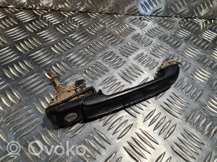 Volkswagen Golf III Front door exterior handle 