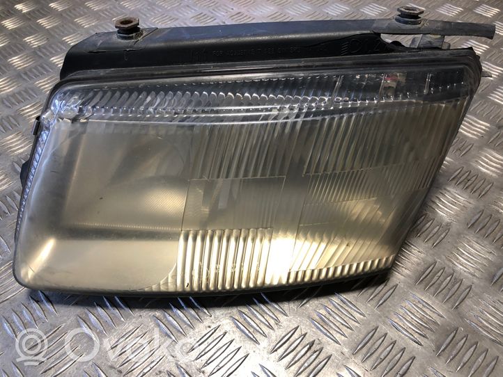 Volkswagen PASSAT B5 Lampa przednia 14869100