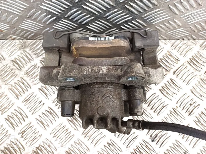 Peugeot 208 Caliper de freno delantero 9824169280