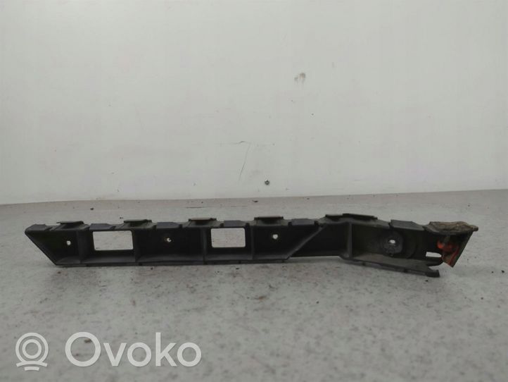 Opel Astra H Uchwyt / Mocowanie zderzaka tylnego 24460467