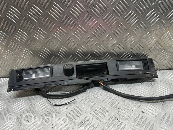 Hyundai Tucson TL Trunk door license plate light bar 87372D7010