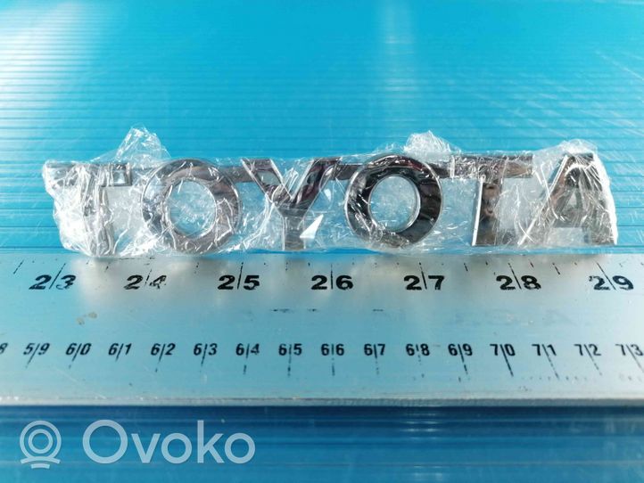 Toyota Hilux (AN10, AN20, AN30) Emblemat / Znaczek tylny / Litery modelu 754690K011