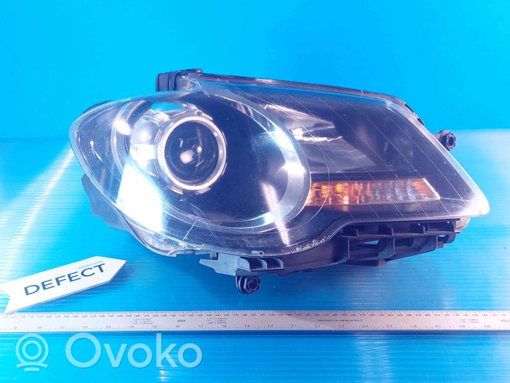 Volkswagen Cross Touran I Lampa przednia 0301233204