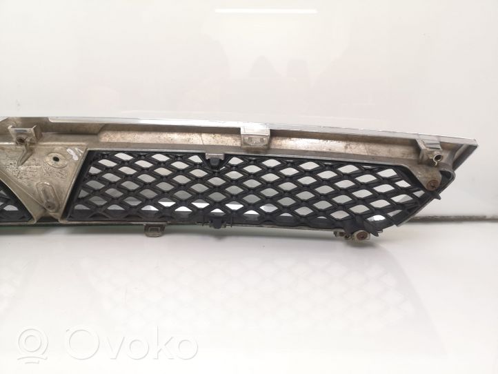 Mitsubishi Lancer X Maskownica / Grill / Atrapa górna chłodnicy 7450A093