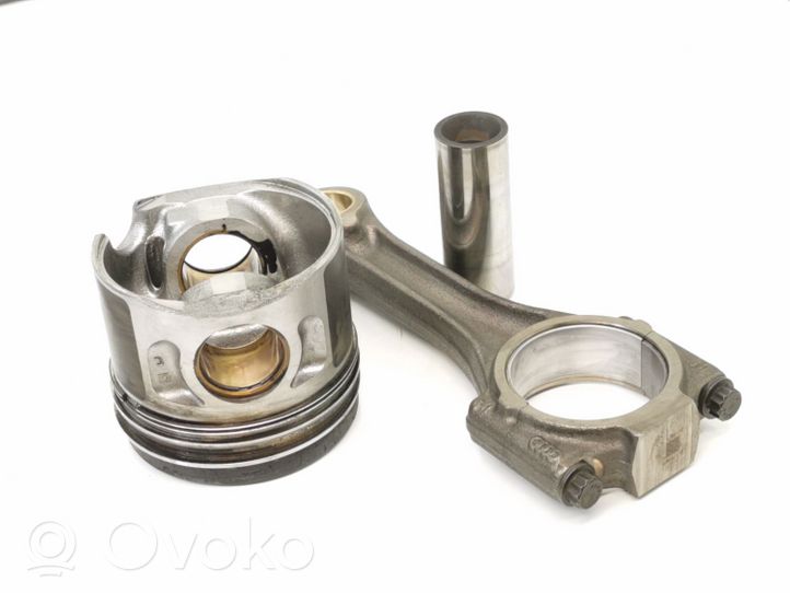 Volkswagen Jetta V Piston with connecting rod 34110605