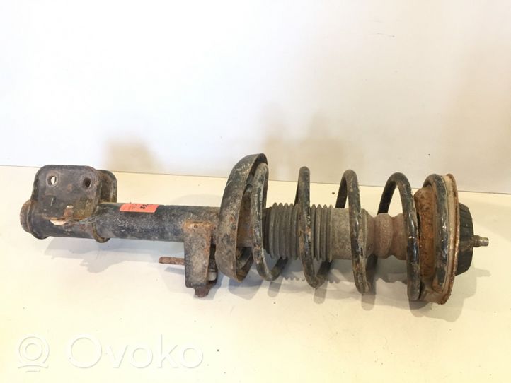 Opel Omega B1 Front shock absorber with coil spring 334903