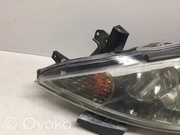 Mitsubishi Grandis Lampa przednia 10087642
