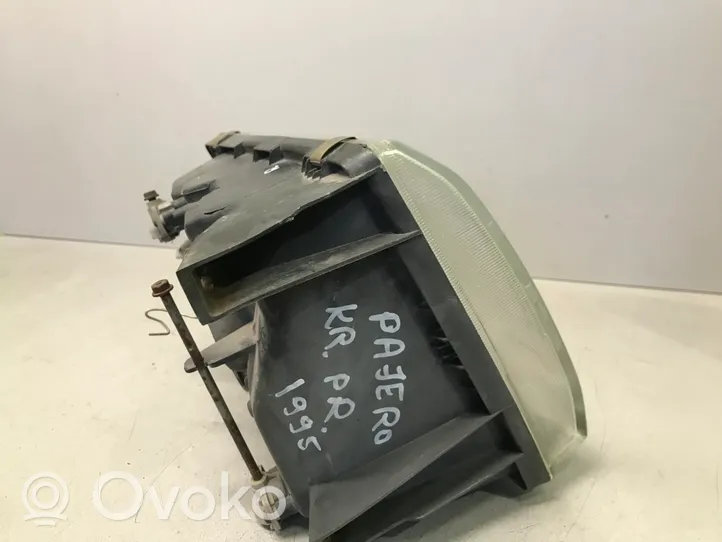 Mitsubishi Pajero Lampa przednia 11037747