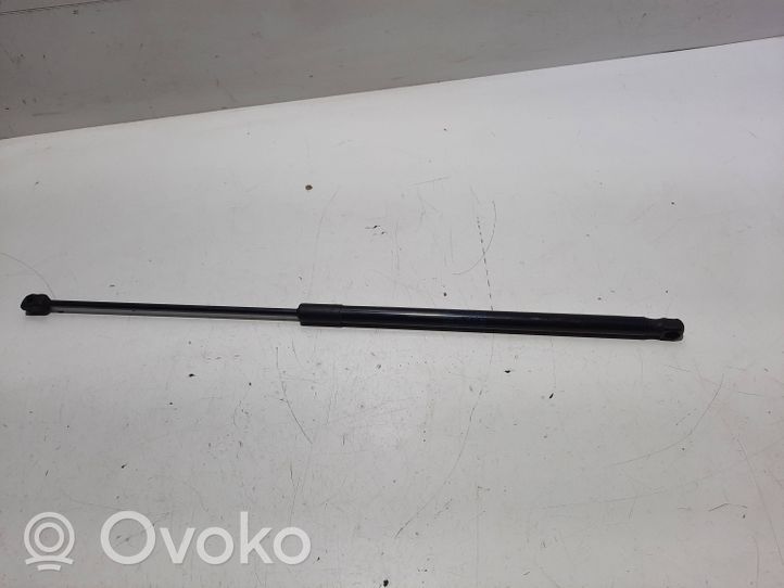 Volkswagen Touareg II Siłownik maski przedniej 7P682335904S