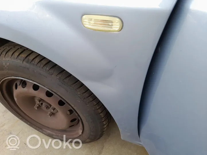 Fiat Grande Punto Błotnik przedni 