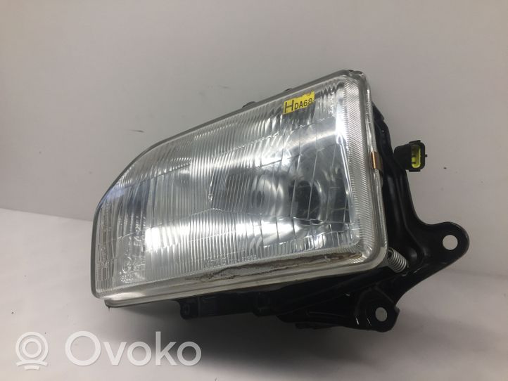 Mazda 121 Faro/fanale 11061238