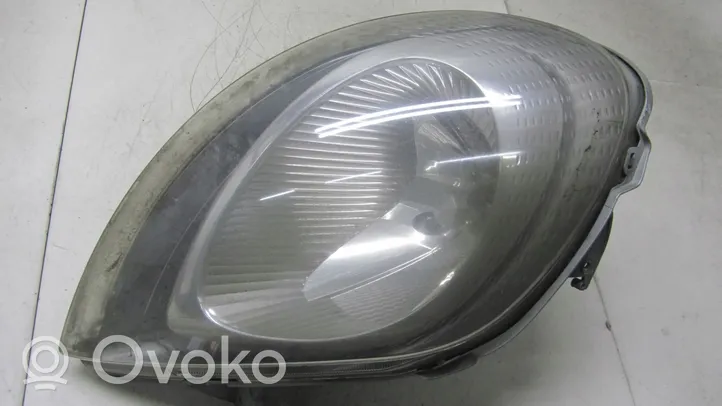 Renault Trafic II (X83) Lampa przednia 7700311372