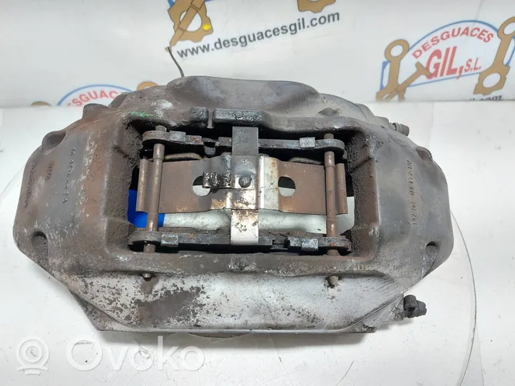 Volkswagen Touareg I Front brake caliper 209236052A