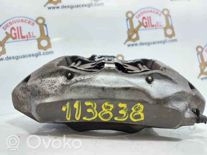 Volkswagen Touareg I Caliper de freno delantero 209236052A