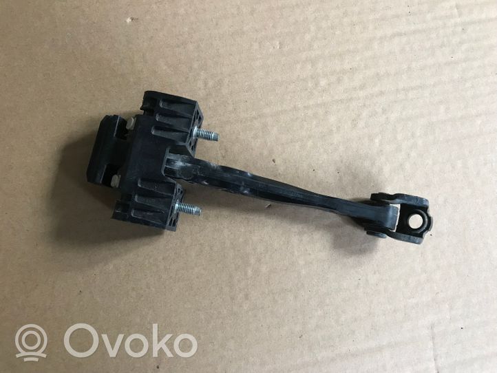 Opel Zafira B Front door check strap stopper 13227947