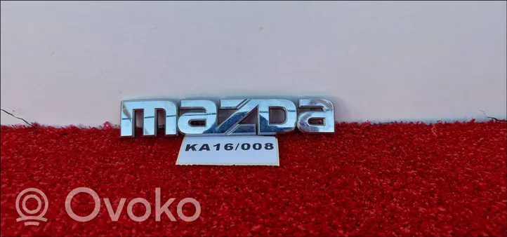 Mazda 626 Logo, emblème de fabricant G21B51771