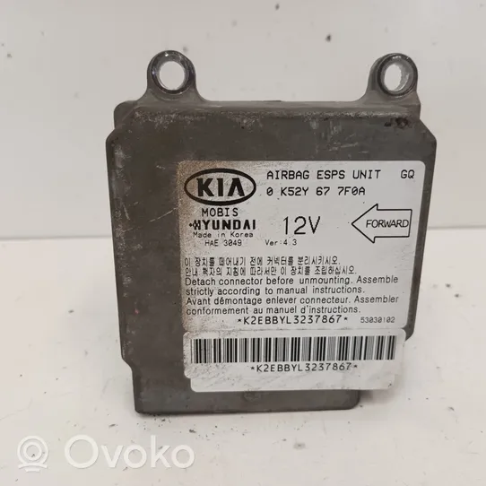 KIA Carnival Gaisa spilvenu vadības bloks 0K52Y677F0A