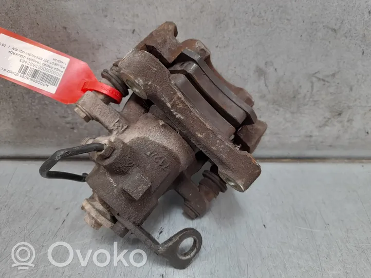 Renault Megane I Caliper del freno trasero 